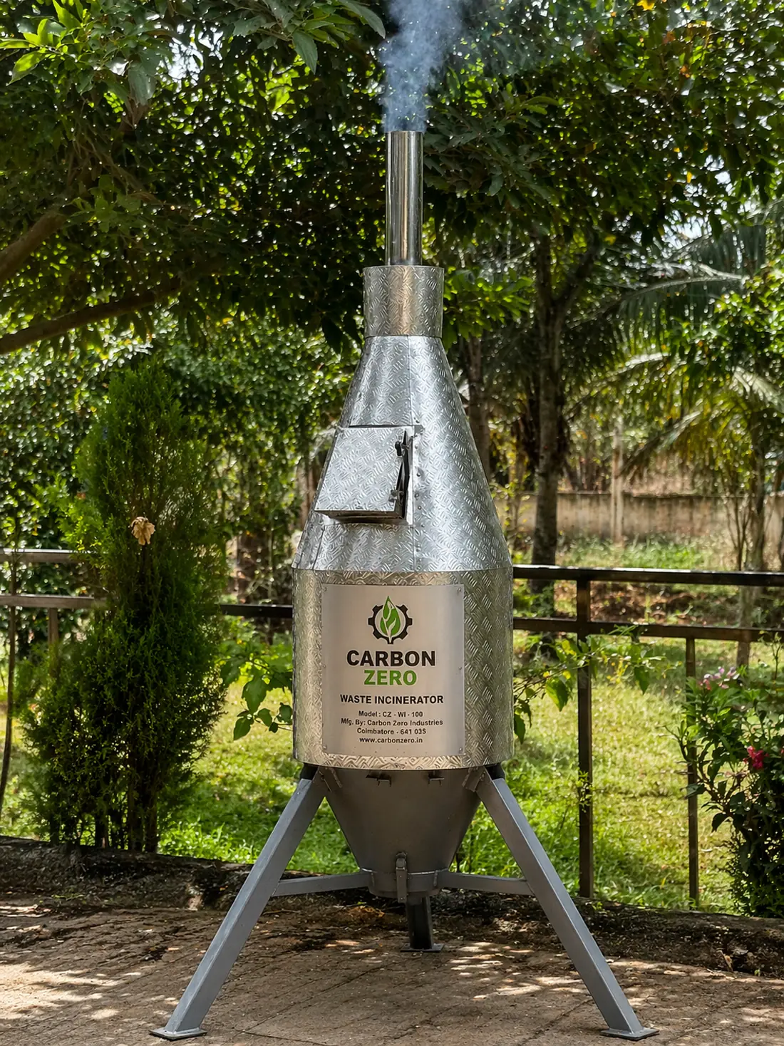 Solid waste incinerator in operation on a farm
